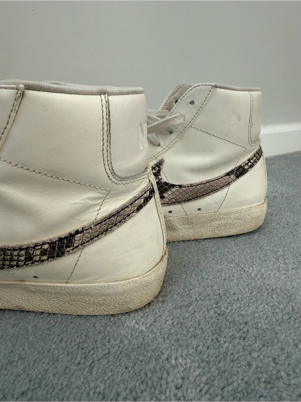 Nike White/Light Gray High-Top Sneaker with Snake Swoosh